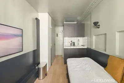 Un ou plusieurs lits dans un hébergement de l'établissement Flexliving - Studio - Manuel