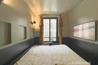 Un ou plusieurs lits dans un hébergement de l'établissement Flexliving - Studio - Manuel