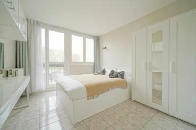 Un ou plusieurs lits dans un hébergement de l'établissement appartement saint ouen sur Seine