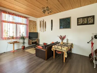 Télévision ou salle de divertissement dans l'établissement Le Penthouse de Boulogne entre la Seine et le Jardin