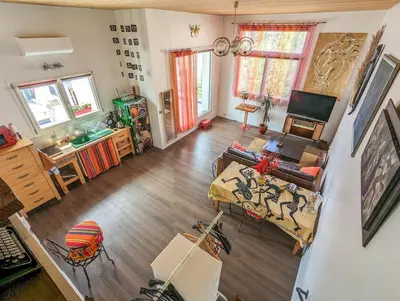 Télévision ou salle de divertissement dans l'établissement Le Penthouse de Boulogne entre la Seine et le Jardin