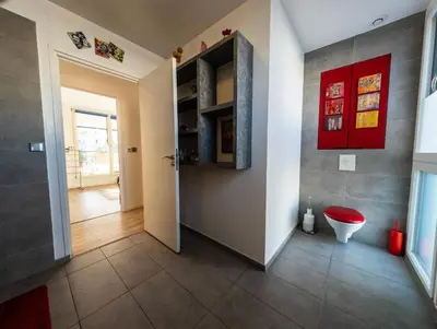 Télévision ou salle de divertissement dans l'établissement Chambre-Salon avec Terrasse sur Jardin