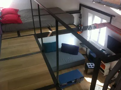 Un ou plusieurs lits dans un hébergement de l'établissement Sunny and serene hideaway in central Paris with AC