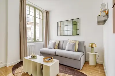 Coin salon dans l'établissement Appartement proche Tour Eiffel