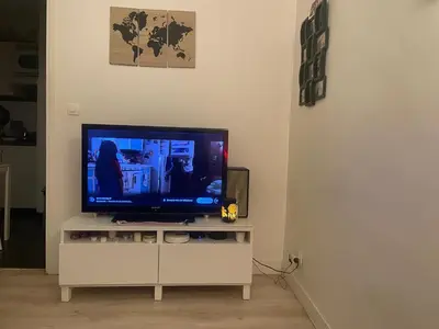 Télévision ou salle de divertissement dans l'établissement Appartement Montrouge