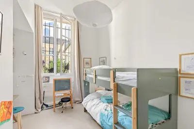 Un ou plusieurs lits dans un hébergement de l'établissement Comme une maison sur l'Île Saint Louis