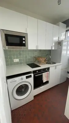 Cuisine ou kitchenette dans l'établissement Grand studio fonctionnel, calme et ensoleillé