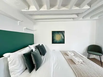 Un ou plusieurs lits dans un hébergement de l'établissement Opera - Premium apartment with lift near Gare de l'Est for 4