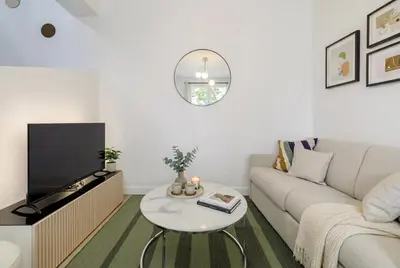 Télévision ou salle de divertissement dans l'établissement Guersant - Maison cosy 6PAX proche Etoile