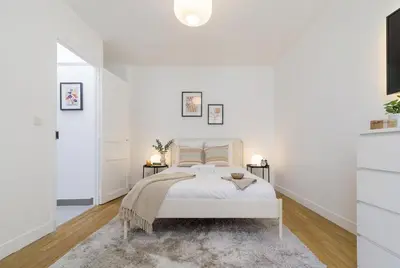 Un ou plusieurs lits dans un hébergement de l'établissement Guersant - Maison cosy 6PAX proche Etoile