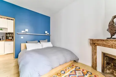 Un ou plusieurs lits dans un hébergement de l'établissement Parisian Charm, Modern & Quiet Studio