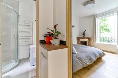 Un ou plusieurs lits dans un hébergement de l'établissement Parisian Charm, Modern & Quiet Studio