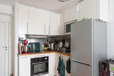 Cuisine ou kitchenette dans l'établissement Apartment of 26 m2 near the park of Belleville