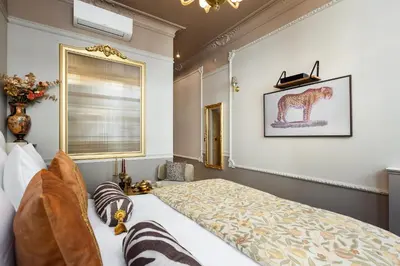 Un ou plusieurs lits dans un hébergement de l'établissement The Donatella Suite - Champs Elysées