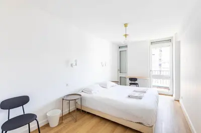 Un ou plusieurs lits dans un hébergement de l'établissement GuestReady - Stylish Stay in the Heart of Javel