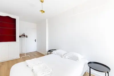 Un ou plusieurs lits dans un hébergement de l'établissement GuestReady - Stylish Stay in the Heart of Javel