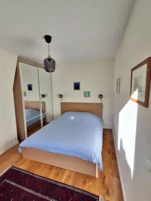 Un ou plusieurs lits dans un hébergement de l'établissement Eiffel Tower family apartment