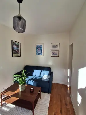 Coin salon dans l'établissement Eiffel Tower family apartment