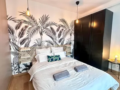 Un ou plusieurs lits dans un hébergement de l'établissement Urban Oasis Paris