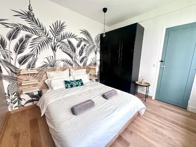 Un ou plusieurs lits dans un hébergement de l'établissement Urban Oasis Paris