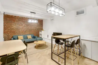 Coin salon dans l'établissement Charmant cocon design 1BR - Proche Montmatre
