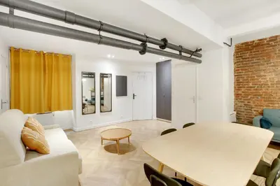 Coin salon dans l'établissement Charmant cocon design 1BR - Proche Montmatre