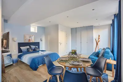 Un ou plusieurs lits dans un hébergement de l'établissement Appartement lumineux dans Paris - Climatisé