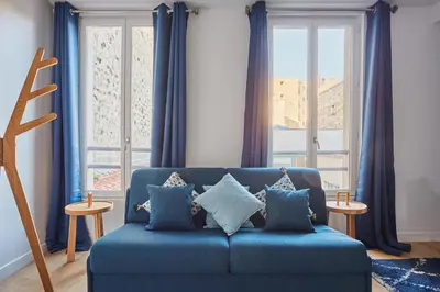 Coin salon dans l'établissement Appartement lumineux dans Paris - Climatisé