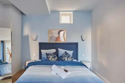 Un ou plusieurs lits dans un hébergement de l'établissement Appartement lumineux dans Paris - Climatisé