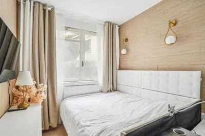 Un ou plusieurs lits dans un hébergement de l'établissement Place Victor Hugo - Mesnil 1bdr by B'Your Home