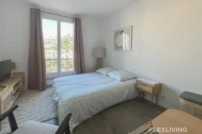 Un ou plusieurs lits dans un hébergement de l'établissement Flexliving - Studio - Patriarches