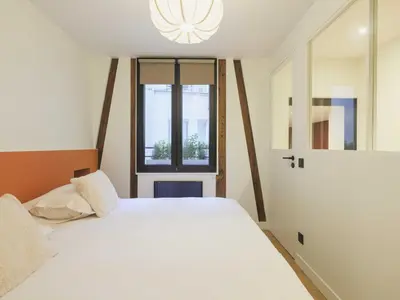 Un ou plusieurs lits dans un hébergement de l'établissement Modern apartment -1BR-2P- Marais