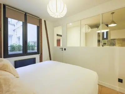 Un ou plusieurs lits dans un hébergement de l'établissement Modern apartment -1BR-2P- Marais