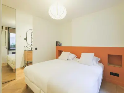 Un ou plusieurs lits dans un hébergement de l'établissement Modern apartment -1BR-2P- Marais