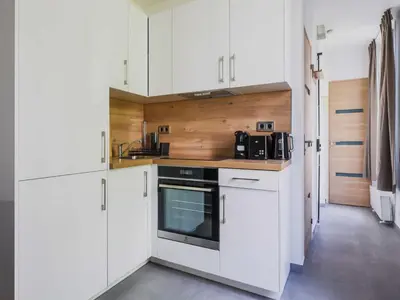 Cuisine ou kitchenette dans l'établissement Elegant flat - 1BD 4P - Montmartre