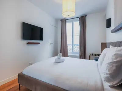 Un ou plusieurs lits dans un hébergement de l'établissement Modern flat - 1BR-4P- Montparnasse