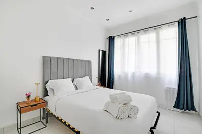 Un ou plusieurs lits dans un hébergement de l'établissement Cozy & Spacious Apartment - 1BDR-4P - Gare de Lyon