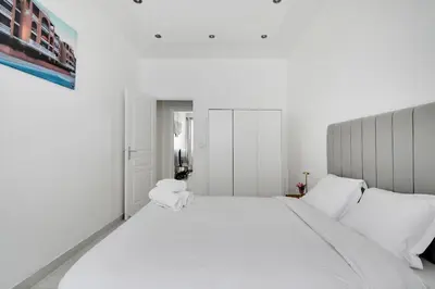 Un ou plusieurs lits dans un hébergement de l'établissement Cozy & Spacious Apartment - 1BDR-4P - Gare de Lyon