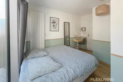 Un ou plusieurs lits dans un hébergement de l'établissement T3 3 chambres avec balcon vie animée et restos