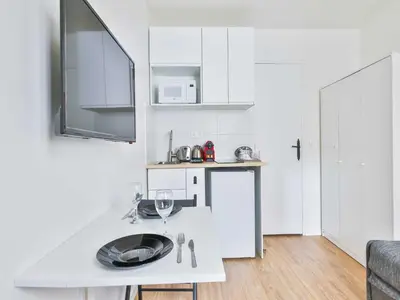 Cuisine ou kitchenette dans l'établissement Cozy appartement -2P- Accor Arena Bercy