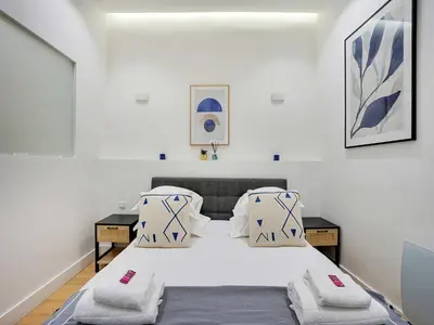 Un ou plusieurs lits dans un hébergement de l'établissement Apartment for 2 people in Bastille