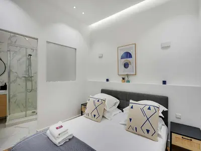 Un ou plusieurs lits dans un hébergement de l'établissement Apartment for 2 people in Bastille