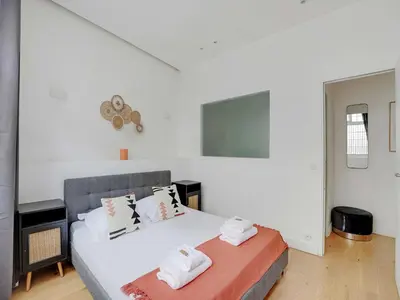 Un ou plusieurs lits dans un hébergement de l'établissement Apartment in Bastille with 1 room