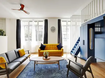 Coin salon dans l'établissement Authentic Loft - 2BR 8P - Oberkampf