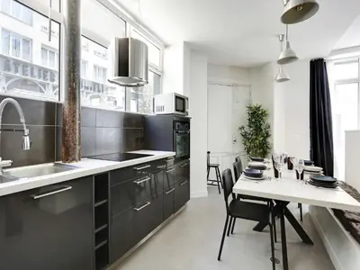 Cuisine ou kitchenette dans l'établissement Authentic Loft - 2BR 8P - Oberkampf
