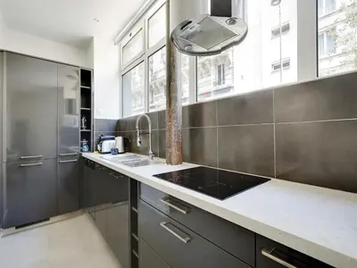 Cuisine ou kitchenette dans l'établissement Authentic Loft - 2BR 8P - Oberkampf