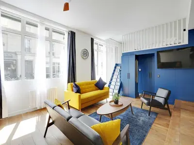 Coin salon dans l'établissement Authentic Loft - 2BR 8P - Oberkampf