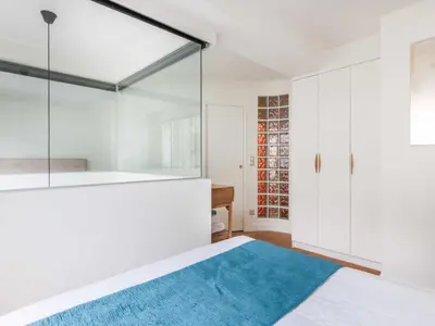 Un ou plusieurs lits dans un hébergement de l'établissement Newly renovated Loft Bastille