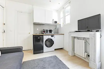 Cuisine ou kitchenette dans l'établissement Apartment Lyon Train Station Bastille