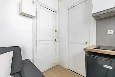 Cuisine ou kitchenette dans l'établissement Apartment Lyon Train Station Bastille